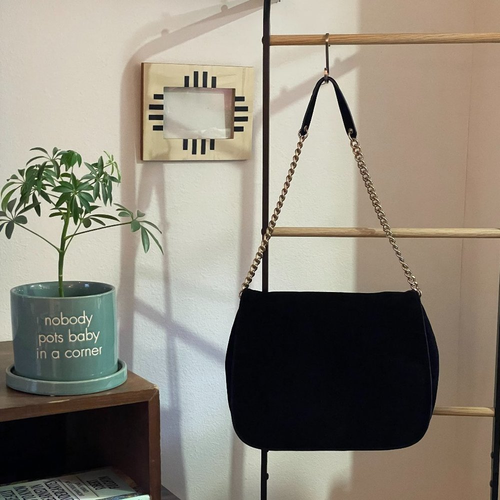 H&M black suede satchel bag with gold link chain strap.